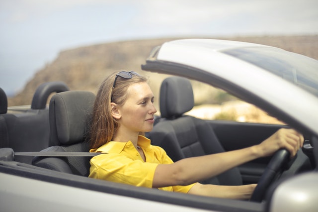 Woman Driving a Car